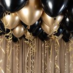 guld svarta ballonger